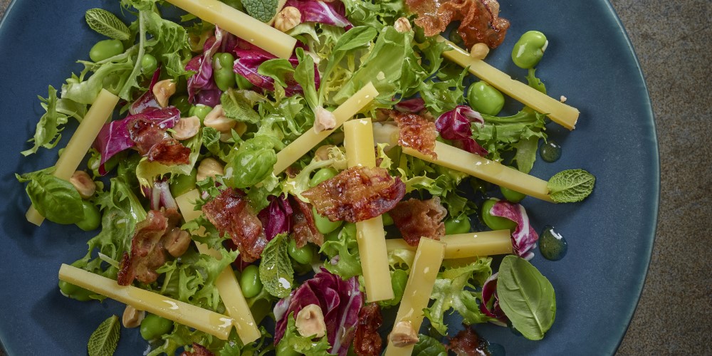 Comté, broad bean, pancetta and hazelnut salad