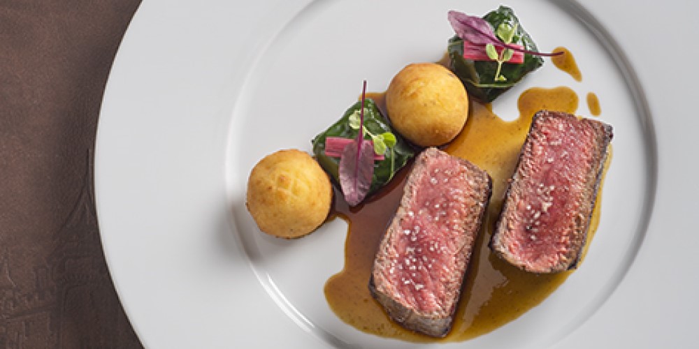 Entrecôte steak, Swiss chard bonbons and truffled dauphinoise potatoes