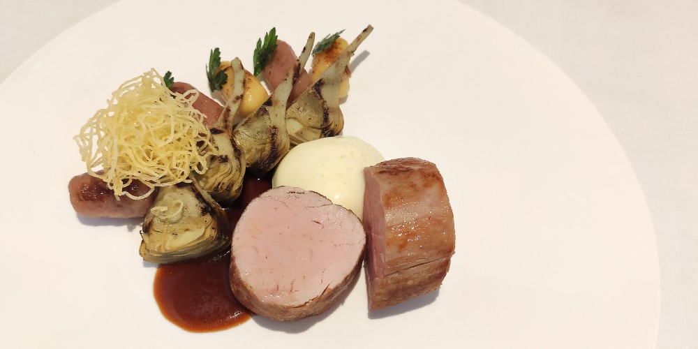 Matthieu Hervé’s veal medallion with potato gnocchi, artichoke barigoule and a hay foam