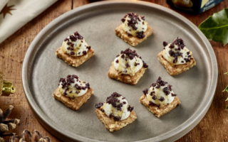Saint Agur crème, oat biscuit and honey canapés
