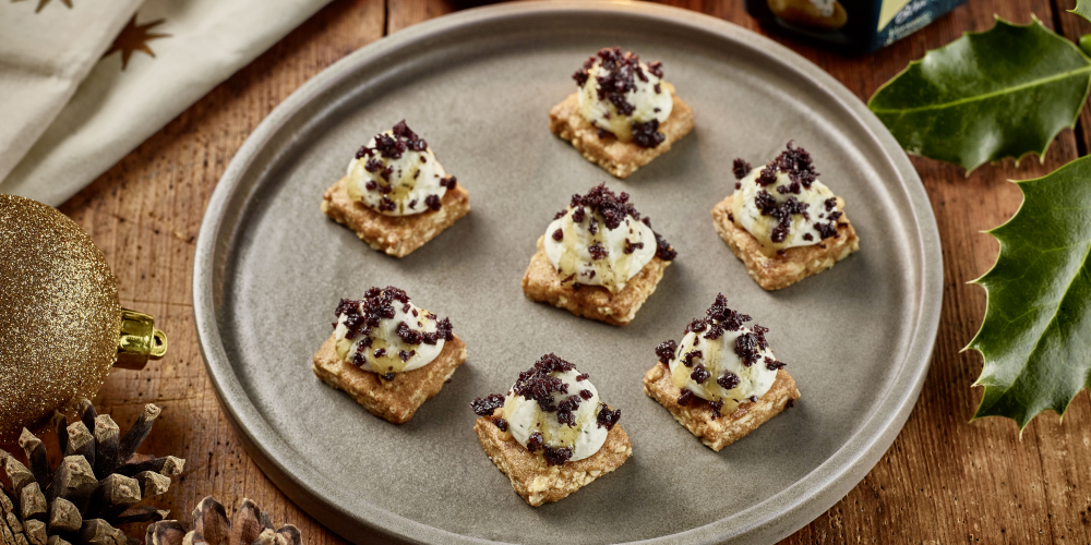 Saint Agur crème, oat biscuit and honey canapés
