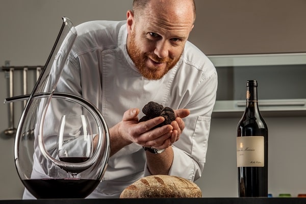 Chef with black truffles