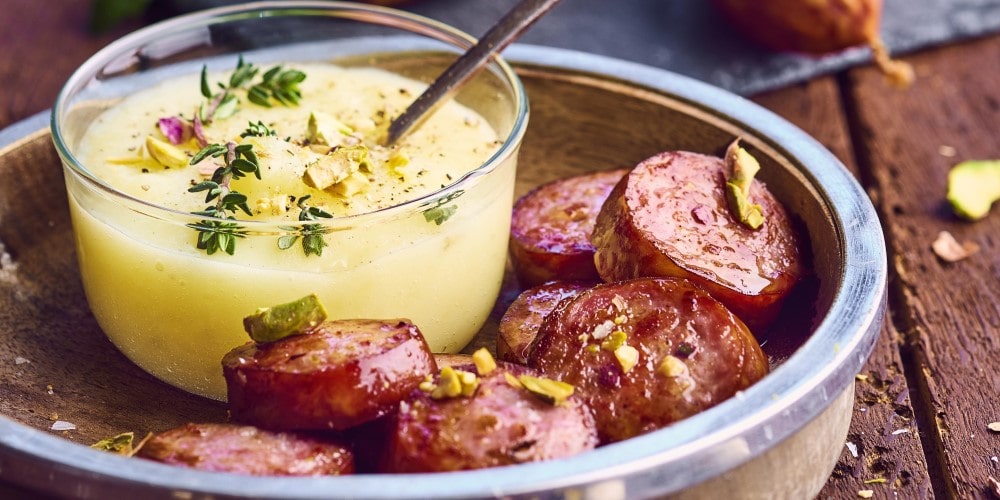Montbéliard sausage with parsnips and pistachios
