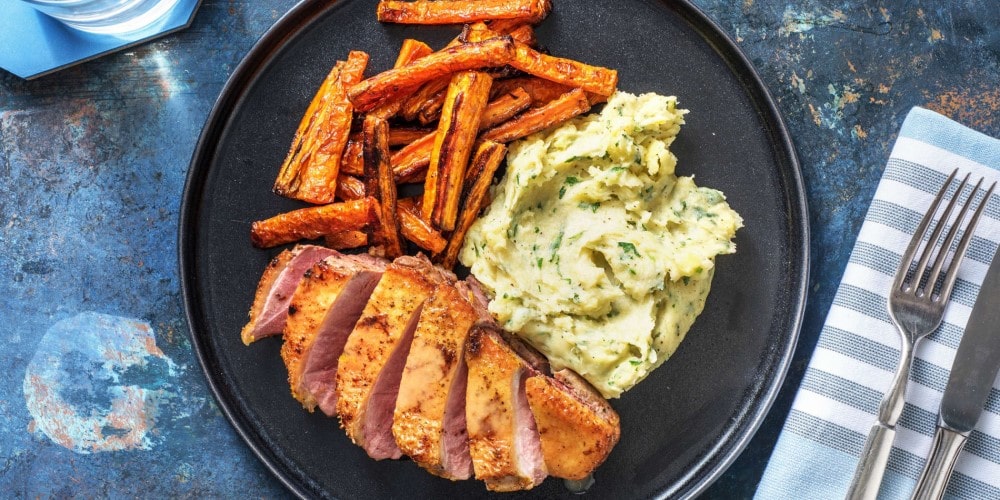 Duck à l’orange with parsley mash and roasted carrots