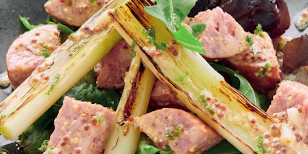 Grilled leeks, morteau sausage and Burgundy mustard-infused vinaigrette