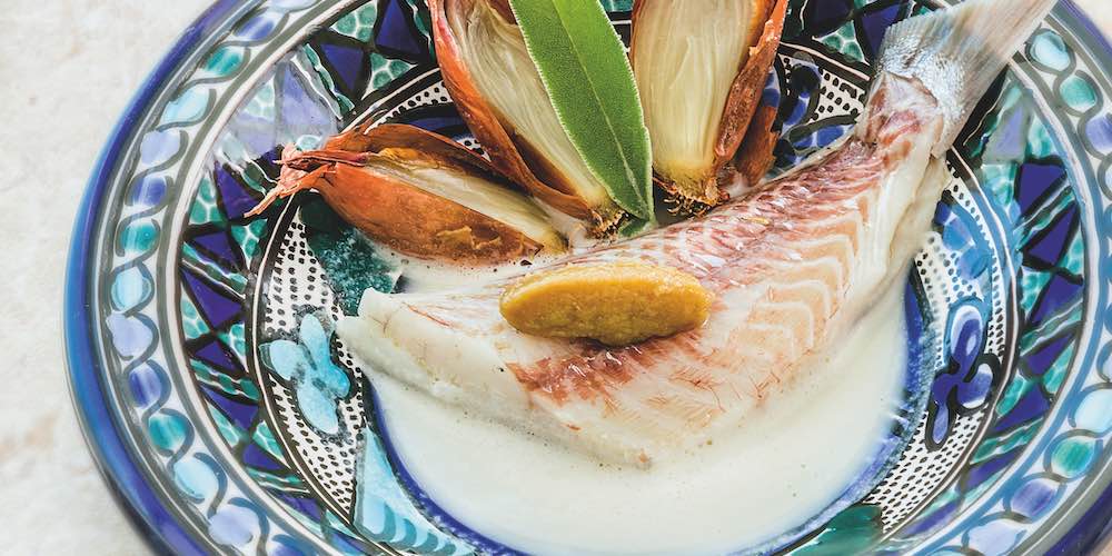 Sea bream in a garlic bouillon