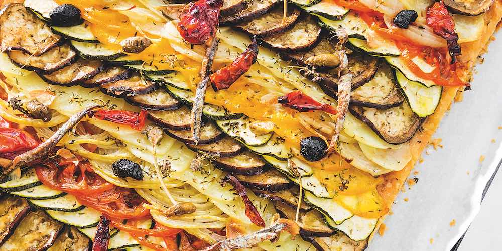 Puff pastry topped with anchovy bayaldi