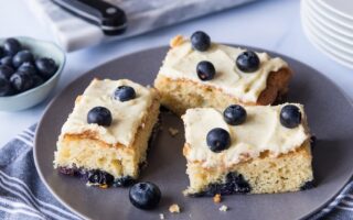 Blueberry traybake with orange cream cheese frosting