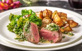 Sirloin steak and bearnaise butter with roasties and tenderstem broccoli