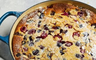 Le Creuset cherry, berry and almond clafoutis