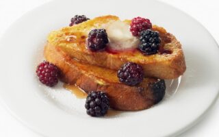 French toast with fresh berries and maple syrup