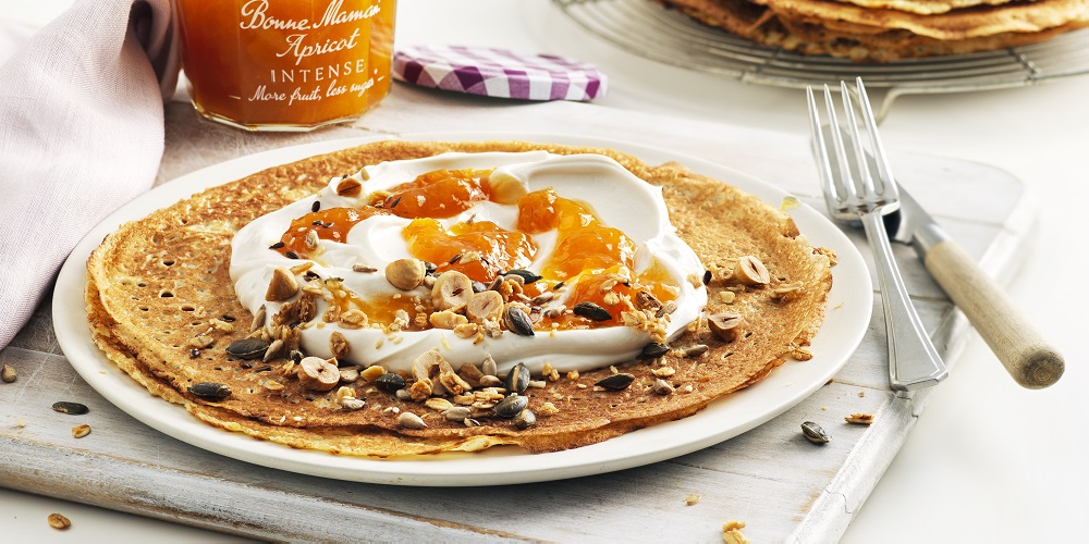 Vegan apricot crêpes with toasted nuts & seeds