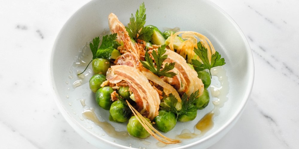 Maple-glazed brussels sprouts with crispy onion and bacon