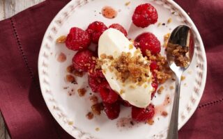 Caramel, black pepper crunch with lime cream and raspberries