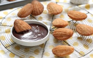 Warm madeleines with chocolate dipping sauce