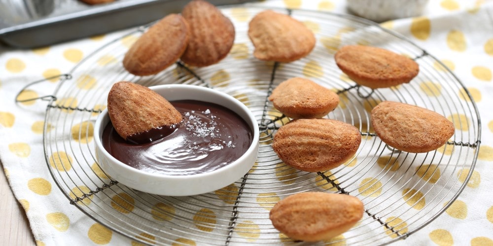 Warm madeleines with chocolate dipping sauce