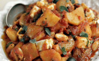 Cassoulet of potatoes with tomato, feta & parsley