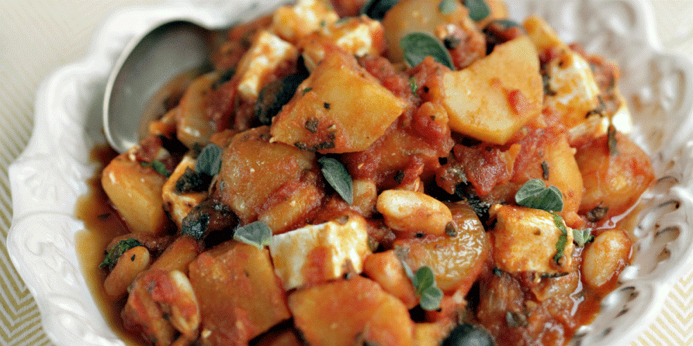 Cassoulet of potatoes with tomato, feta & parsley
