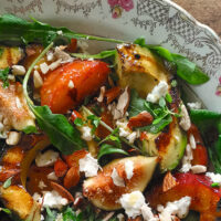 Grilled peach and avocado salad with goat cheese