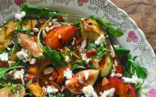 Grilled peach and avocado salad with goat cheese