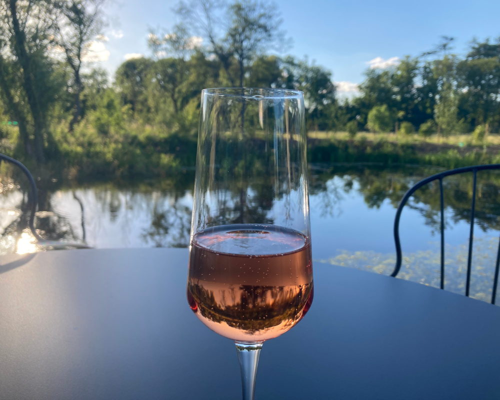Sparkling Rosé Aperitif by the pond