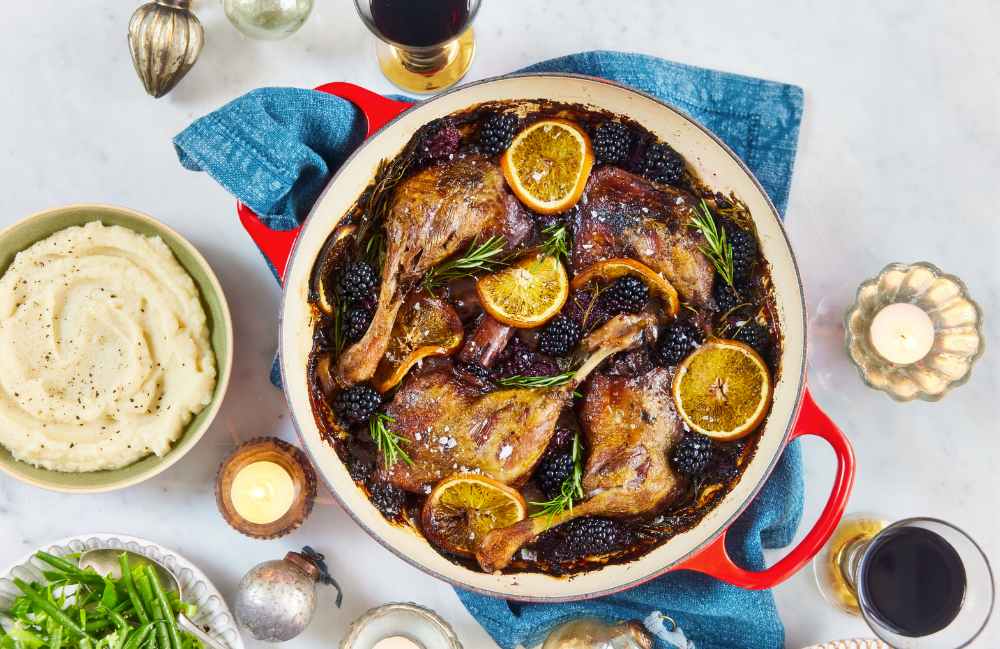 Slow cooked duck legs with blackberries, orange, and cinnamon